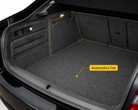 Open car trunk lined with automotive felt